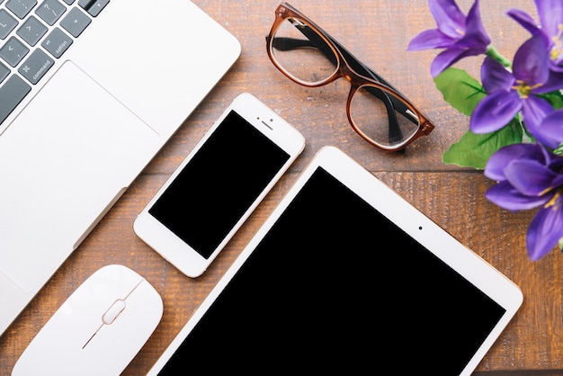 Modern office desk composition with technological device