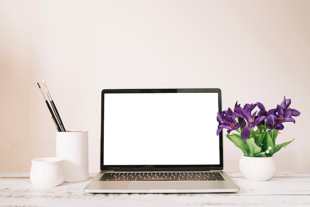 Modern office desk composition with technological device