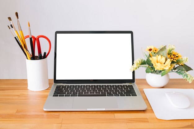 Modern office desk composition with technological device