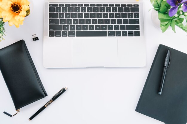 Modern office desk composition with technological device