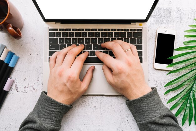 Modern office desk composition with technological device