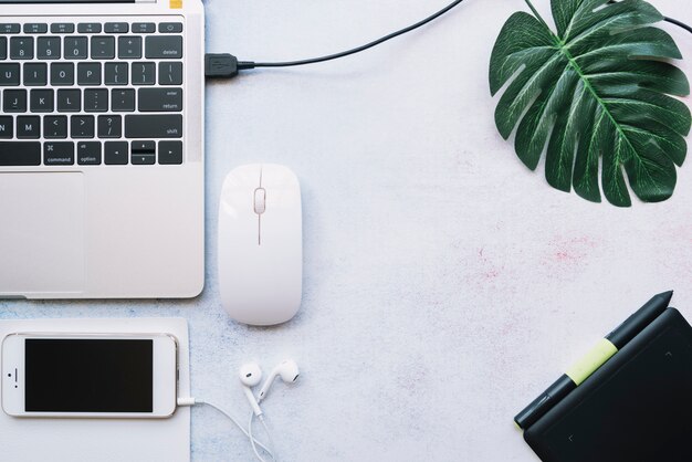 Modern office desk composition with technological device