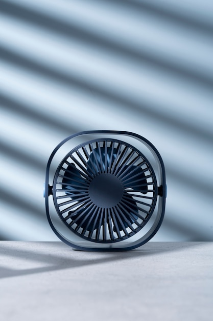 Modern round desk fan with simple background