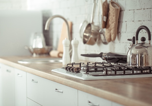 Modern stylish Scandinavian kitchen interior with kitchen accessories.