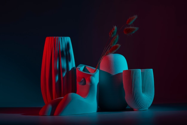 Free photo modern vases with red and blue light arrangement