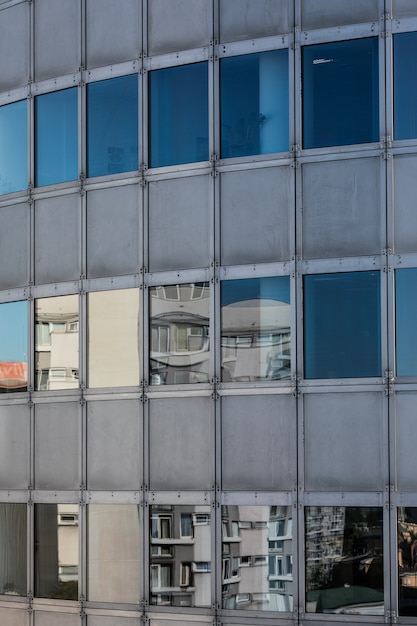 Free photo modern window glass skyscrapers background with reflection