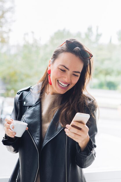 Modern woman drinking coffee