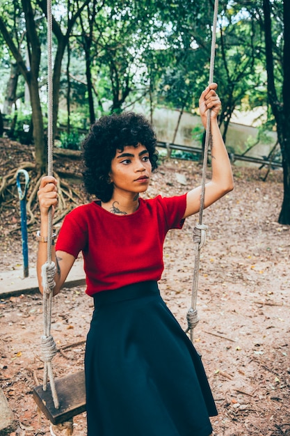 Free photo modern woman in a park