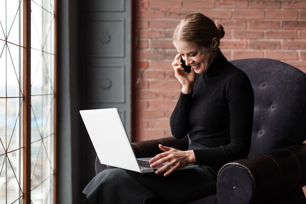 Modern woman talking over phone