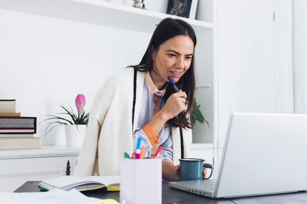 Modern woman using laptop