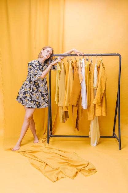 Free Photo modern woman next to wardrobe