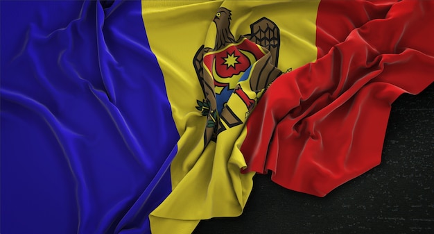 Free photo moldova flag wrinkled on dark background 3d render