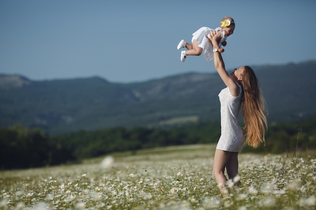 mom and cute baby outdoor