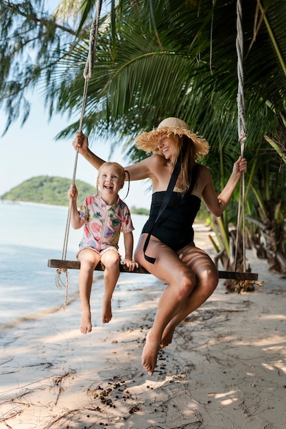 Mom and daughter enjoying their sunny holiday