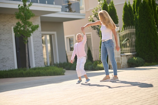 Mom and daughter spending weekend together and having fun