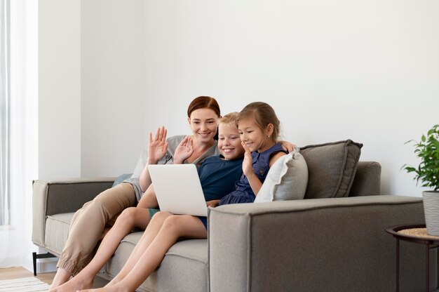 Mom doing a family videocall with her kids