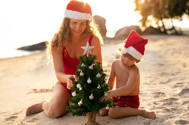 Mom and son celebrating christmas in july