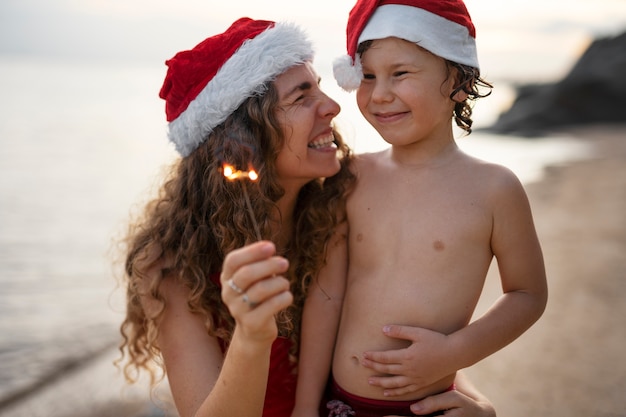 Mom and son celebrating christmas in july