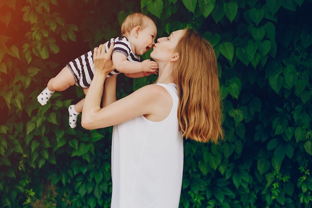 Mom and son relax in the park.