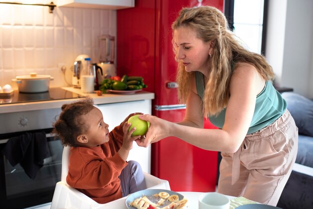 Mom spending time with her black baby