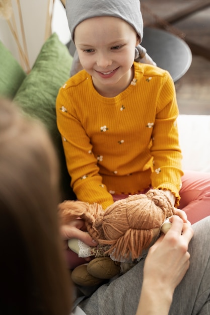 Mom spending time with her child while in therapy