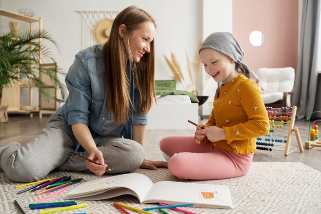 Mom spending time with her child while in therapy