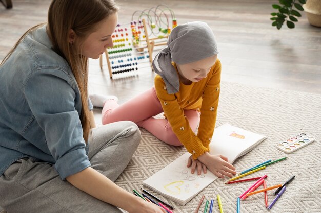 Mom spending time with her child while in therapy