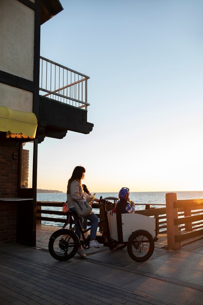 Mom traveling with child using sustainable mobility