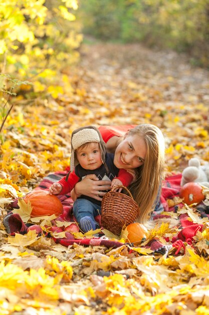 Mom with cute little baby looking at camera