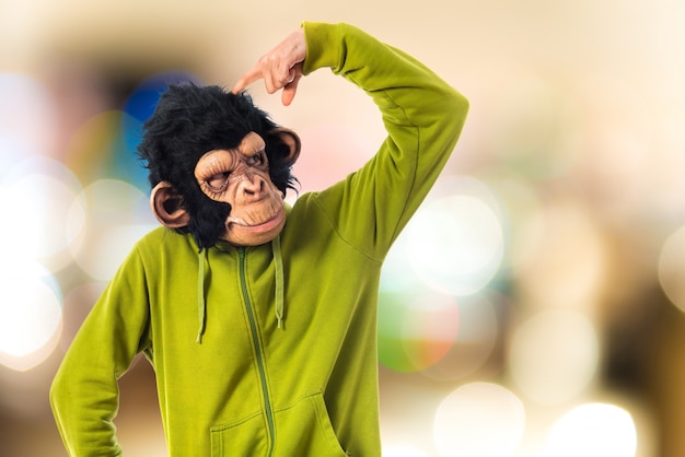 Free photo monkey man thinking over white background