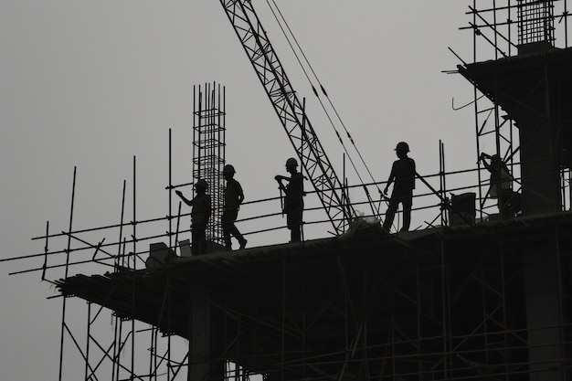 Free Photo monochrome scene depicting life of workers on a construction industry site