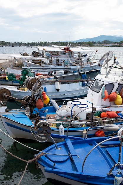 Free photo moored boats with lots of fishing accessories in the sea port, aegean sea