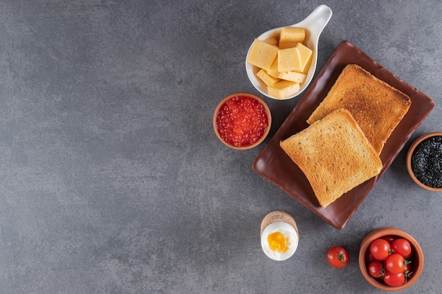 Morning breakfast placed on a marble surface. 