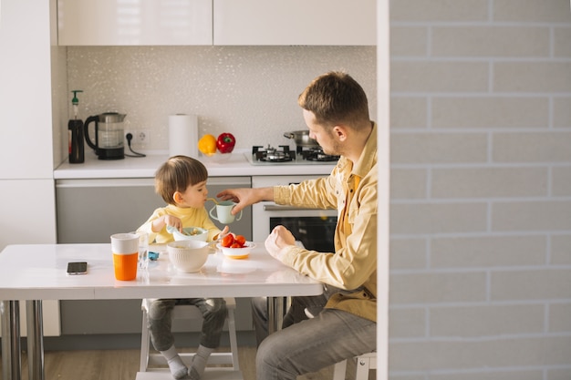 Morning breakfast with father and son