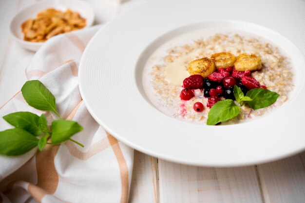 Morning meal with crushed cereals high view