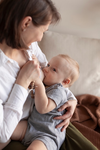 Mother breast feeding her baby