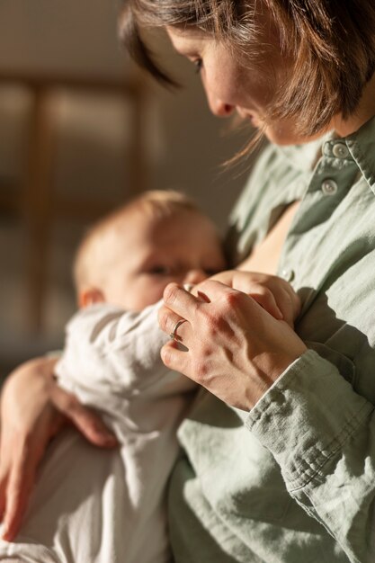 Mother breast feeding her baby