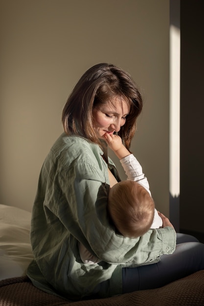 Mother breast feeding her baby