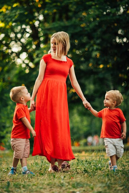 Mother and children playing in the park