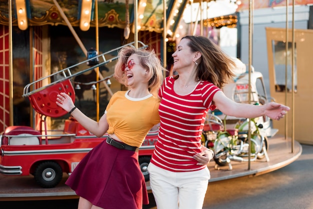 Mother and daughter at amusement park