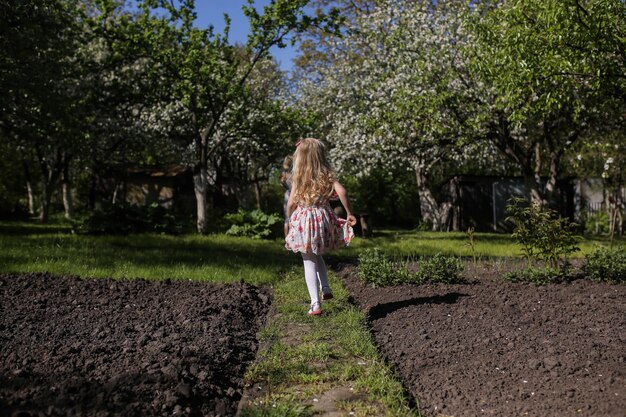 Mother and daughter in the garden