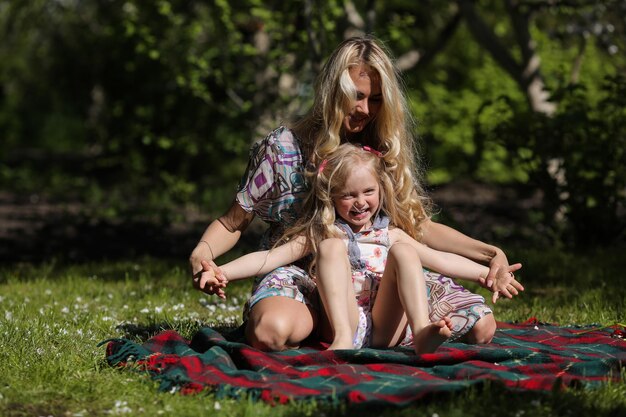 Mother and daughter in the garden