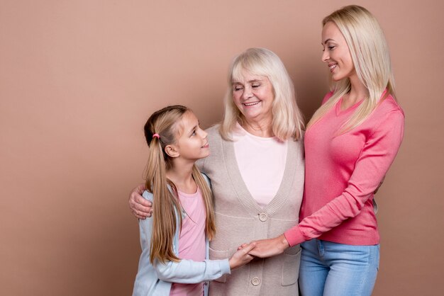 Mother and daughter holding hands