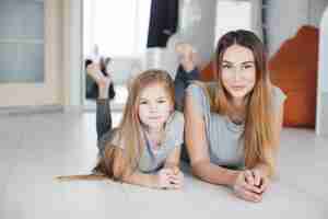 Free photo mother and daughter at home