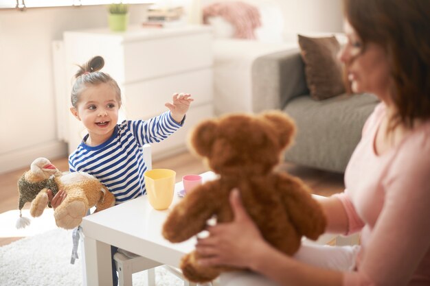 Mother and daughter playing