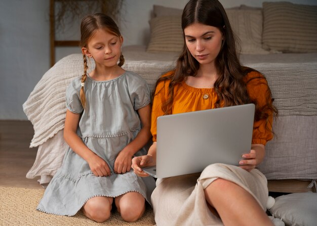 Mother and daughter spending time together while wearing linen clothing