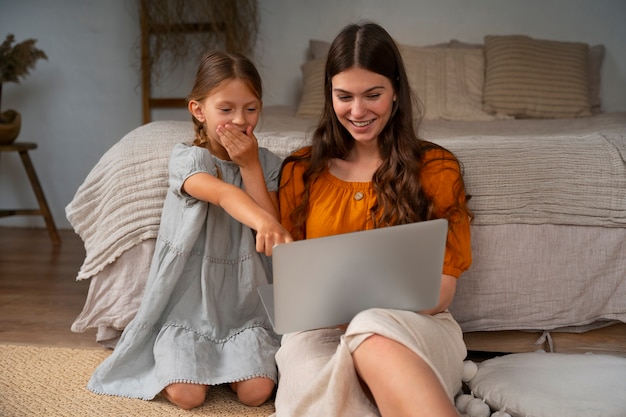 Mother and daughter spending time together while wearing linen clothing