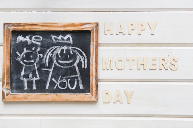 Free Photo mother day composition with slate and letters