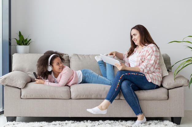 Mother happy to work from home with her daughter