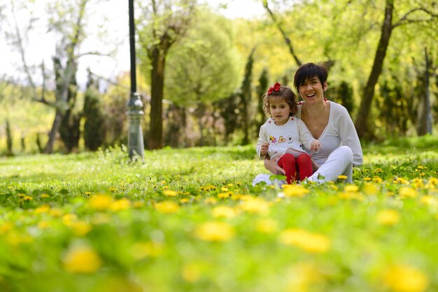 Mother having fun with her daughter in nature